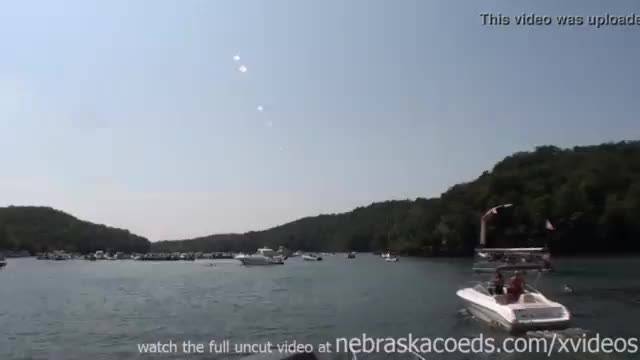 Dancing and partying topless on a boat