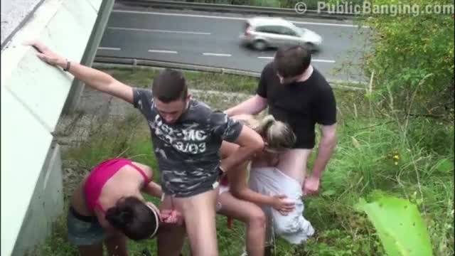 2 guys fuck 2 girls with one fat girl with very big tits by a highway bridge