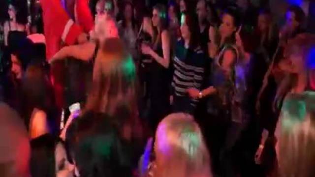 Hot brunettes dancing at party